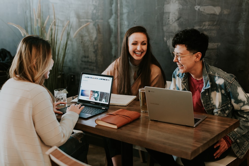 Students and teacher collaborating with AI learning tools in a modern classroom