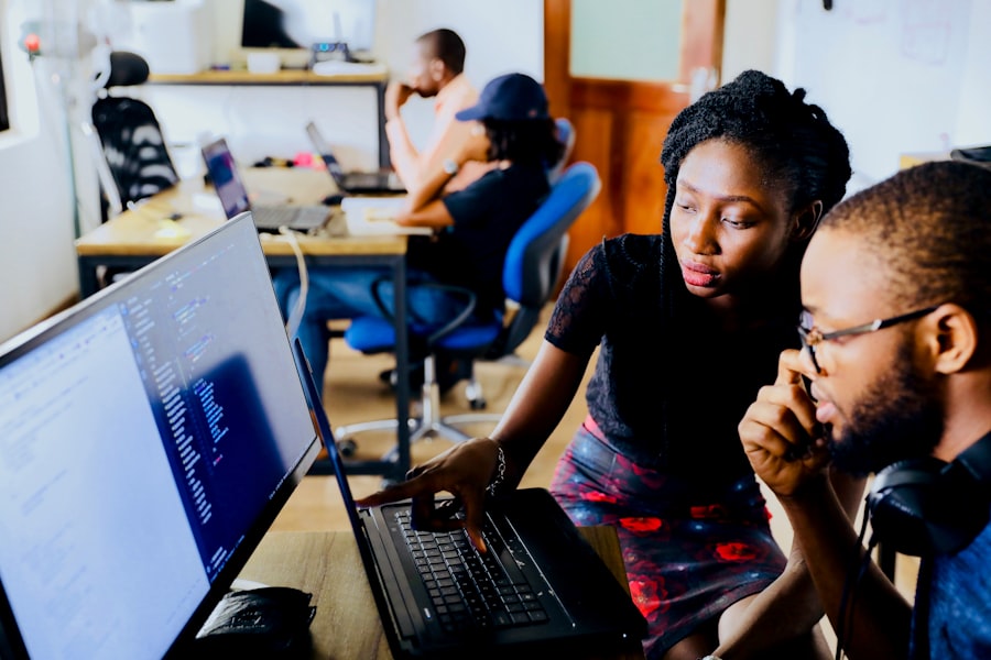 Teacher using a laptop dashboard to manage AI-assisted lessons and student progress
